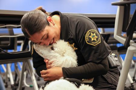 Probation Officer holding Support K9
